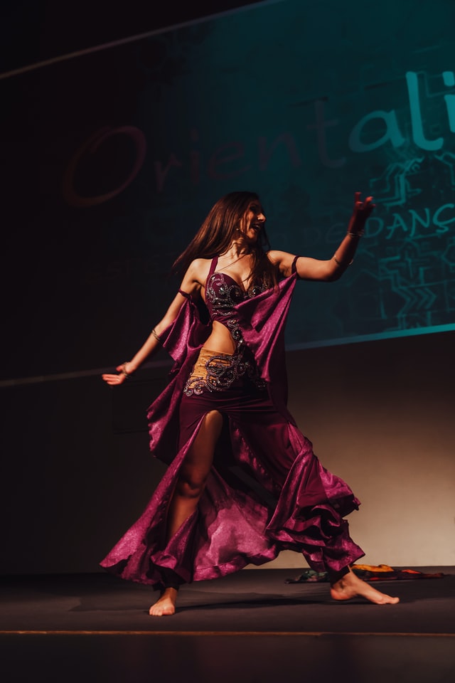 Adult Bollywood dance class - beginners learning colorful Indian cinema dance moves